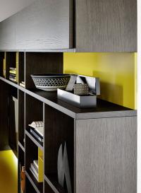 Detail of shoulders, shelves and vasistas doors in oak veneer and backs in matte mustard lacquer (colour not available)
