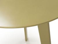 Detail of the coffee table in brass metallic finish