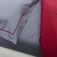 Detail of the contrasting edge on the pillow cases with piping 