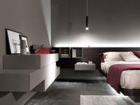 Corner layout with shaped panels, big drawers, open elements and bedside table