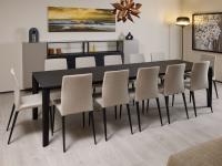 The Winston extending table comfortably seats up to 12 diners thanks to the side extensions