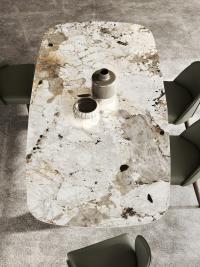 Modern table Odyssey with a top in glossy Patagonia ceramic, available in a rectangular or barrel-shape version