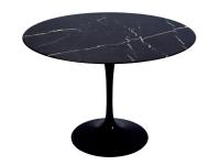 Saarinen table with round black Marquina marble top and central base with a fluid, sinuous appearance