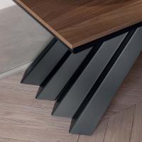 Detail of the metal lacquered base and of the melamine table with wood effect