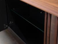 A close up of the matt-black lacquer interior with glass shelves