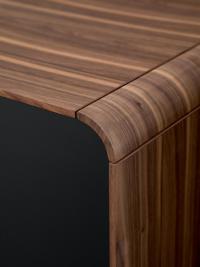 Details of the rounded corners obtained from a single curved veneer wood panel