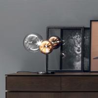 Lampada da tavolo Atomo nella versione vetro fumè trasparente, vetro bronzo cromato e vetro rame cromato