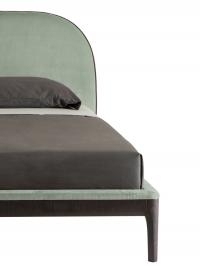 Thin wooden bed frame with matching padding on headboard
