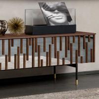 Drops TV stand with charcoal grey lacquered metal base and brass finish feet
