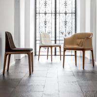 Mivida tub armchair available in two models with solid-wood base