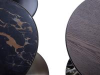 Detail of the wooden top in heat-treated dark oak wood veneer and portoro porcelain stoneware 