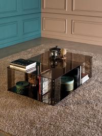 The Dedalo designer glass coffee table for the living room also allows storage on the base