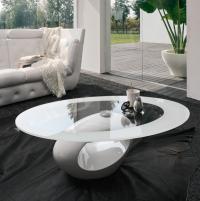 Dubai elliptical coffee table with a white lacquered sculptural base and white serigraph finished extra-clear glass top, designed for a front sofa position.