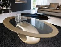 Dubai elliptical coffee table with sculptural champagne lacquered base and extrawhite champagne screen-printed glass top, designed for sofa front.