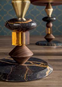 Detail of the jewel base in Port Saint Laurent marble, canaletto walnut, amber glass and gold insert