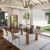 Brooklyn extending table with bronze glass top and canaletto walnut structure