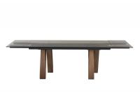Butterfly extending table with clear bronze glass top and Canaletto walnut legs
