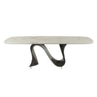 Wave shaped rectangular table with Macchiavecchia matt porcelain stoneware top and brushed titanium Baydur base