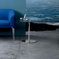Alias is a contract end table in a round shape with chrome metal base. Here with grey laminate HPL top