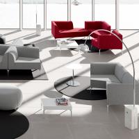 Alias end tables and coffee tables matched with modules and armchairs belonging to the same collection