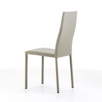 Royale chair with fine structure and soft and sinuous backrest line
