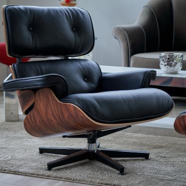 Eames Sessel aus blondem Nuß und schwarzem Leder