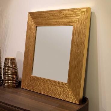 Iole Spiegel aus Lärche geschnitzt blattgold und grey lackiert