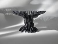 Runder Tisch mit geformtem Fuß aus Birke in schwarz lackierter Ausführung