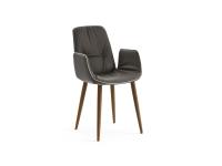 Ansprechender Stuhl mit Kunstlederprofil mit Armlehnen Betta. Bezug in Leder und Beine aus Eschenholz gebeizt Nussbaum Canaletto.
