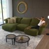 Divano verde di diotti.com in un salotto arredato in stile moderno