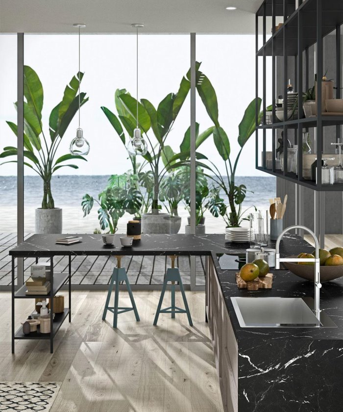 Cucina angolare con piano in marmo nero venato bianco e pensili contenitori minimalisti