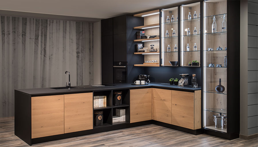 Black white and wooden kitchen with no handles