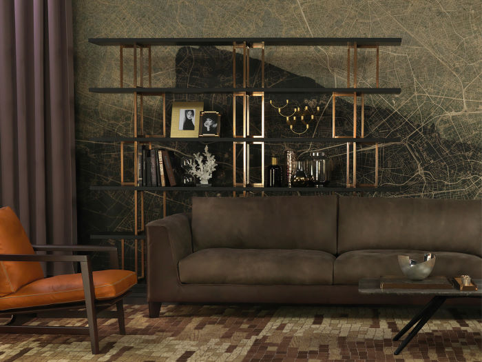 Esempio di salotto con divano, poltrona e libreria di design